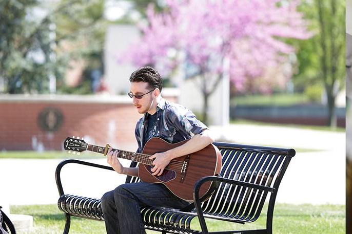 guy playing guitar